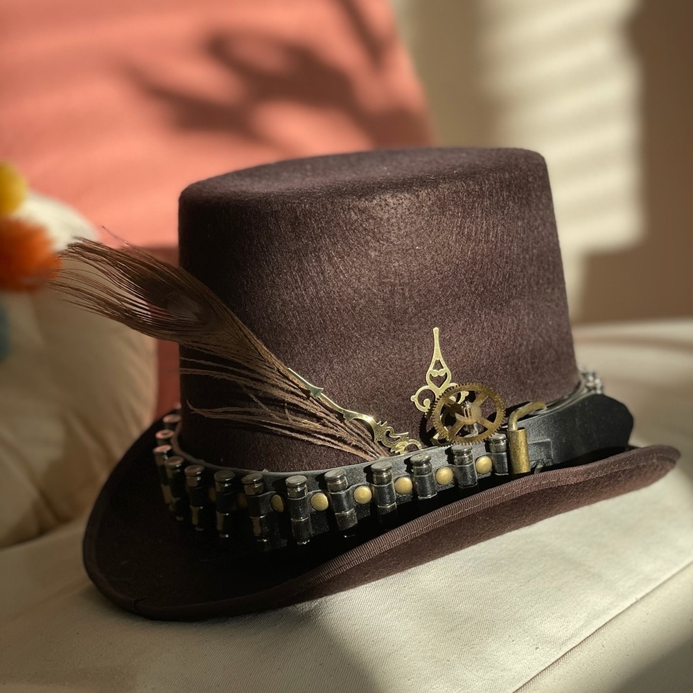 Elsie Massey Steampunk top hat with clock parts, bullets and feather